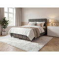 Boxspringbett in Grau mit einem Bettkasten