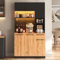 Holzoptik trifft auf LED Beleuchtung an dem Sideboard